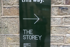 Sign for The Storey Gardens: 'Tasting garden this way'.
